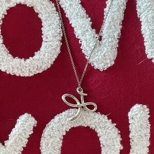 Tiffany & Co. Elsa Paretti Large Collector’s Open Infinity Cross Necklace $375.